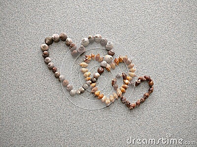 three diagonal connected hearts created with atlantic snail shells Stock Photo