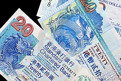 Three different bills in twenty Hong Kong dollars on a dark background Editorial Stock Photo