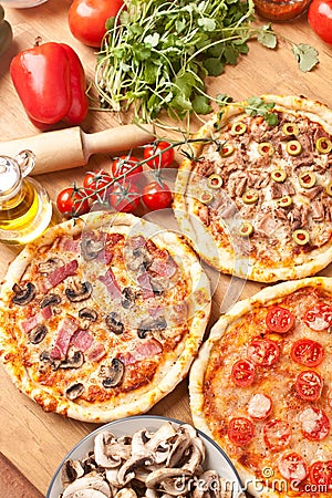 Three different kind of pizzas Stock Photo