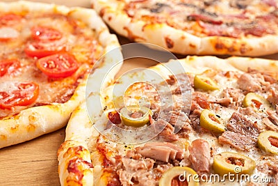 Three different kind of pizzas Stock Photo