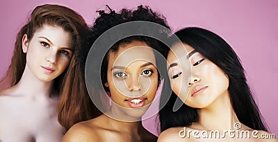 Three different nation girls with diversuty in skin, hair. Asian, scandinavian, african american cheerful emotional Stock Photo