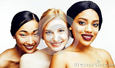 Three different nation woman: asian, african-american, caucasian together isolated on white background happy smiling Stock Photo