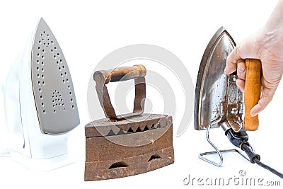 Three different times the iron with hand on a white background isolated, the beginning of the 20th century, the middle Stock Photo