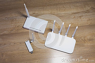 Three different types of Wi-Fi routers, modern and old technology. Wireless ethernet connection signal Stock Photo