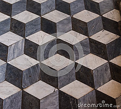 The three-dimensional effect f a marble cube floor in a church Stock Photo