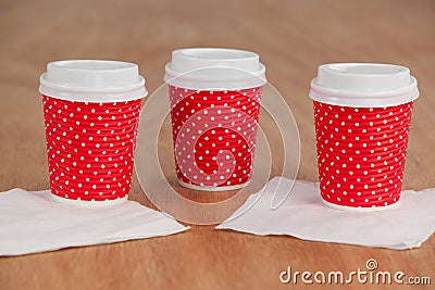 Three disposable coffee cup with tissue paper Stock Photo