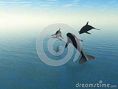 Three dolphins above the sea Stock Photo