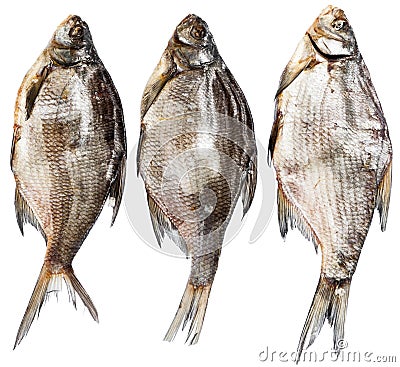 Three dried and solt freshwater fishes, isolated on white background Stock Photo