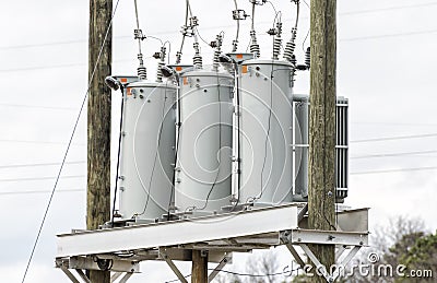 Three Electric Utility Transformers Stock Photo