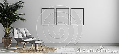 Three empty vertical picture frame mockup in bright modern room interior with gray armchair and palm tree, empty room interior Stock Photo