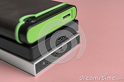 the three external hdd drives one the shelf, data backup storage Stock Photo