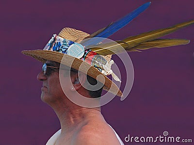 Three Feathers in His Straw Hat For Jazzfest Editorial Stock Photo