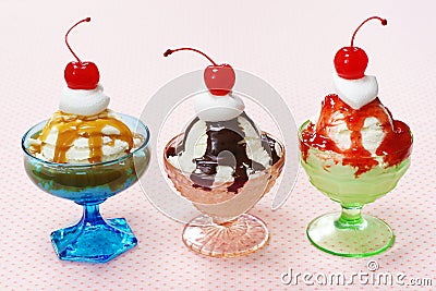 Three Flavors of Ice Cream Sundaes in Vintage Glass Dishes Stock Photo