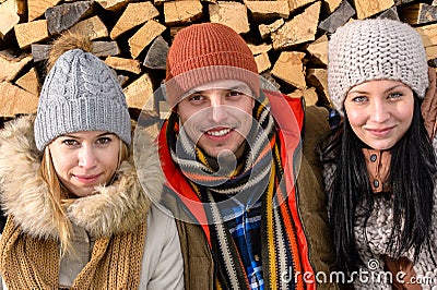 Three friends wearing winter clothes outdoor Stock Photo