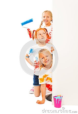 Three funny kids in painted shirts Stock Photo