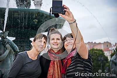 Three generation family of travelers stop for selfie Stock Photo