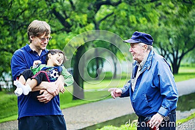 Three generations interacting Stock Photo