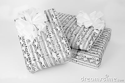 Three gift boxes with sheet music Stock Photo