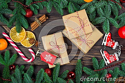 Three gifts in retro packaging on a wooden table close-up, objects Christmas Stock Photo