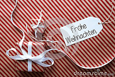 Three Gifts, Wrapping Paper, Label Frohe Weihnachten Mean Merry Christmas Stock Photo