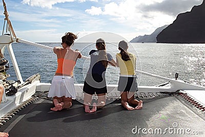 Three Girls on a Sailboat in Kauai Stock Photo