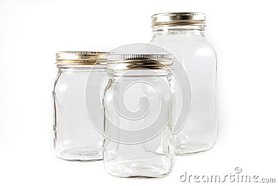 Three glass mason jars on an isolated background Stock Photo