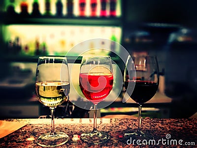 Three glasses of different kinds of wine at the bar - wine concept Stock Photo