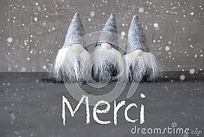 Three Gray Gnomes, Cement, Snowflakes, Merci Means Thank You Stock Photo