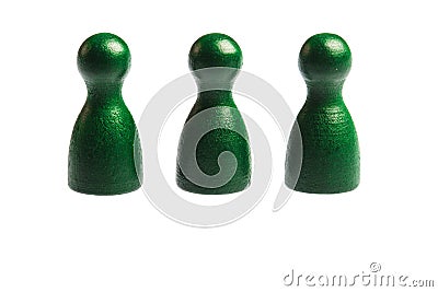 Three green pawn game figures Stock Photo