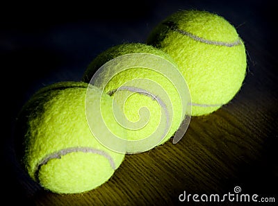 Three green tennis balls Stock Photo