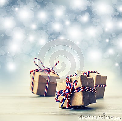 Three handmade gift boxes in shiny colour background Stock Photo