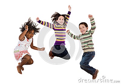 Three happy children jumping at once Stock Photo