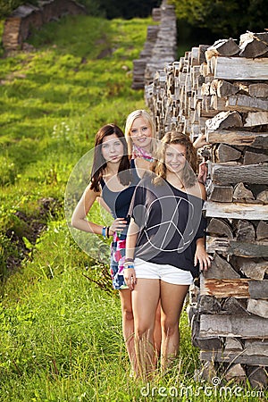 Three happy and smiling teenage girls Stock Photo