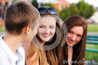 Three happy young teenagers Stock Photo