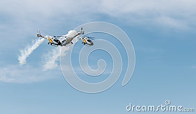 Three helicopters doing acrobatic flights crashed together Stock Photo