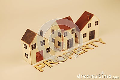 Three homes with the word property displayed Stock Photo