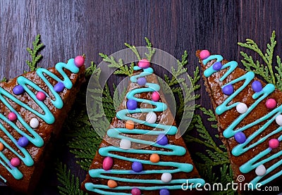 Three honey cakes decorated as Christmas fir trees Stock Photo