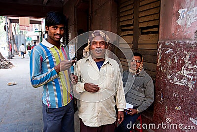 Three indian friends of different ages talking Editorial Stock Photo