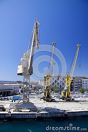 Three industrial cranes Stock Photo