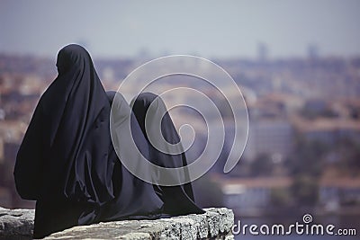 Islamic women wearing burqua, Istanbul Stock Photo