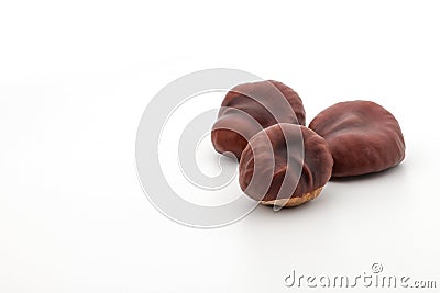 A group of three isolated chestnuts Stock Photo