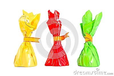 Three isolated colorful candies Stock Photo