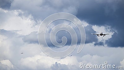 Three jet planes / aircrafts enters landing runway at a airport Stock Photo