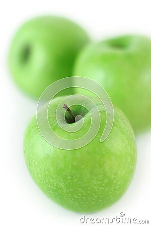 Three juicy green apples Stock Photo