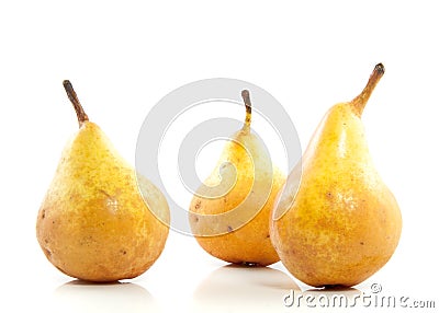 Three juicy yellow pears Stock Photo