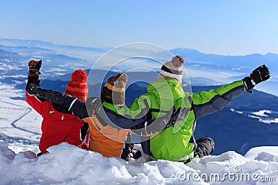 Three kids on a mountain Stock Photo