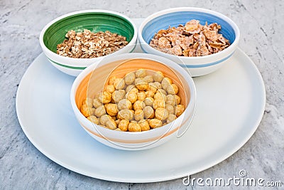 Three kind of cold breakfast cereals in bowl Stock Photo