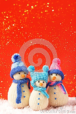 Three knitted snowmen Stock Photo