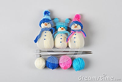 Three knitted snowmen Stock Photo