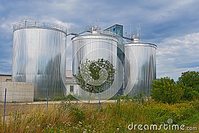 Three large settling tanks for the sewage treatment plant Stock Photo